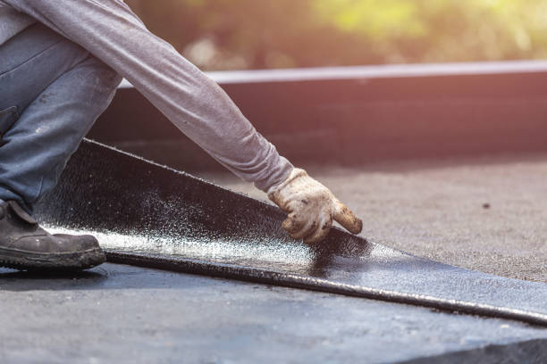 Professional Basement Waterproofing technician working in Milan, TN